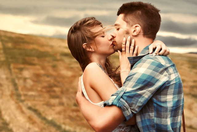 Man woman kissing field cloudy free wallpaper - medium preview image