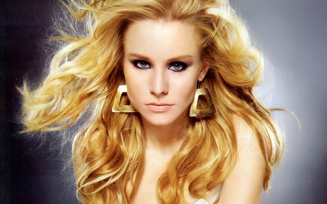Woman blonde hair big earrings free wallpaper - medium preview image