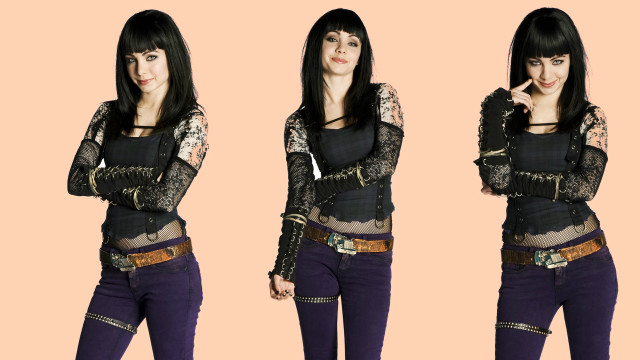 Woman black top purple pants #2 free wallpaper - medium preview image