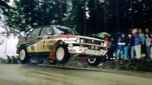 Car jumping hill dirt people free wallpaper - medium preview image
