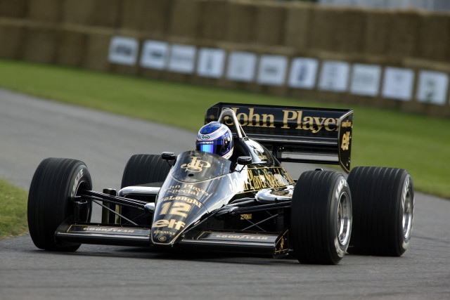 Man driving racing car track #2 free wallpaper - medium preview image