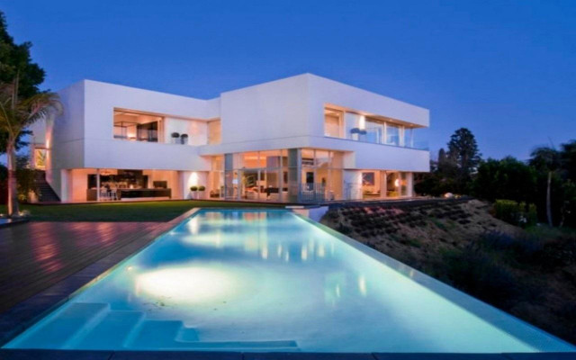 Large white house pool night free wallpaper - medium preview image