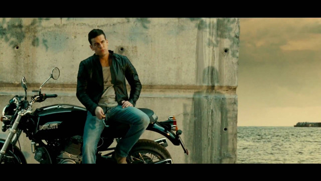 Man motorcycle water concrete wall free wallpaper - medium preview image