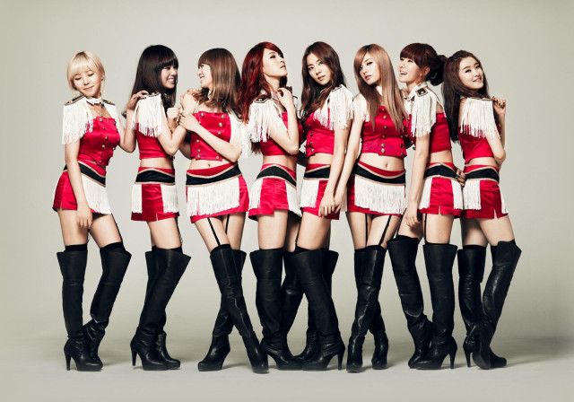 Girls short skirts boots posing free wallpaper - medium preview image