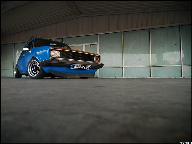 Blue truck garage building window free wallpaper - medium preview image