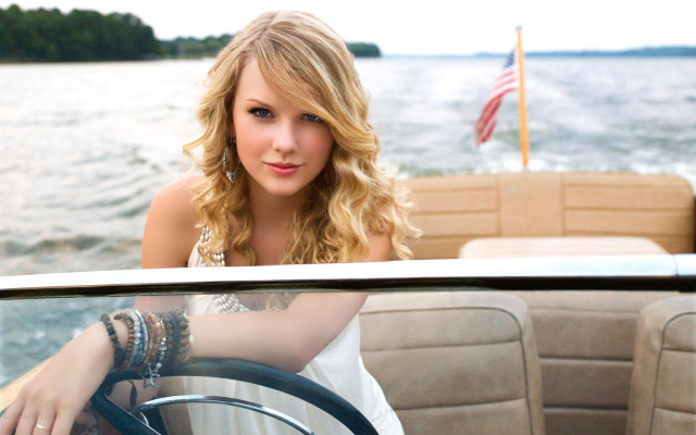 Woman boat steering wheel flag free wallpaper - medium preview image
