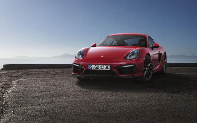 Red porsche sports car ocean free wallpaper for desktop - medium preview image