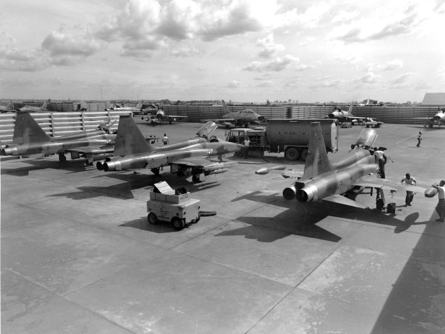 Airplanes runway people trucks black free wallpaper - medium preview image