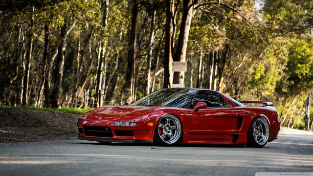 Red sports car parked road #2 free wallpaper - medium preview image
