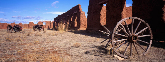 Wagon wheel desert adobe buildings free wallpaper - medium preview image