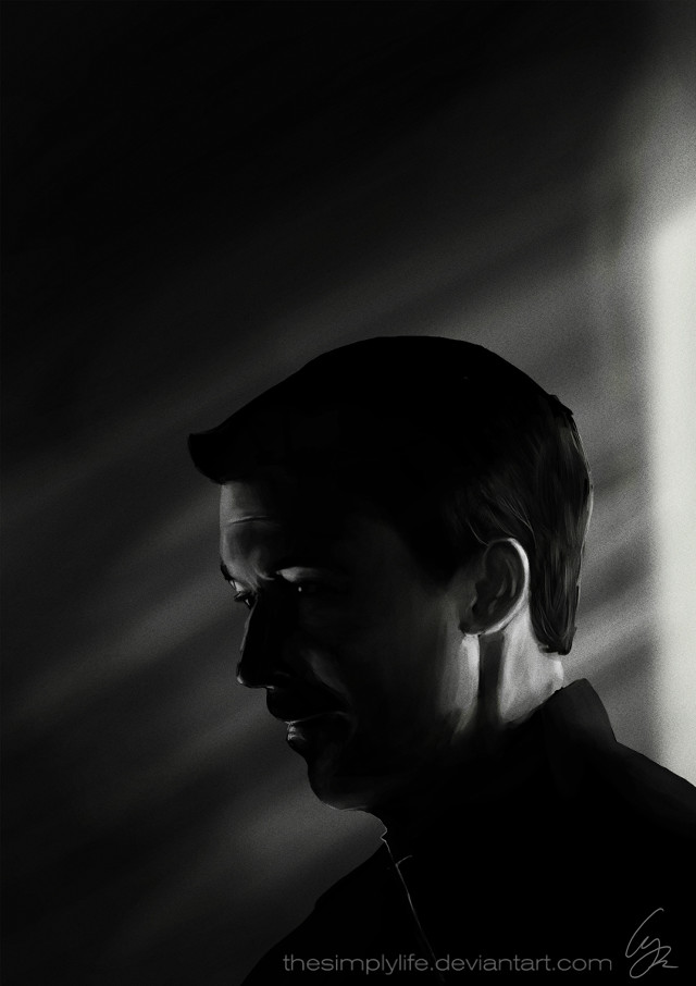 Man hat black shirt looking free wallpaper - medium preview image