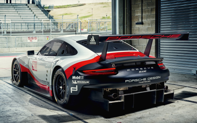 Porsche race car garage ramp free wallpaper - medium preview image