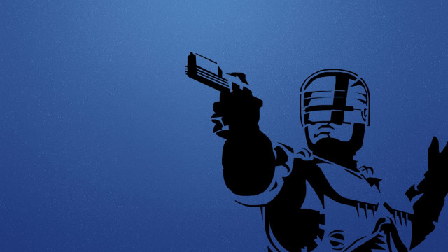 Man holding gun wearing helmet free wallpaper - medium preview image