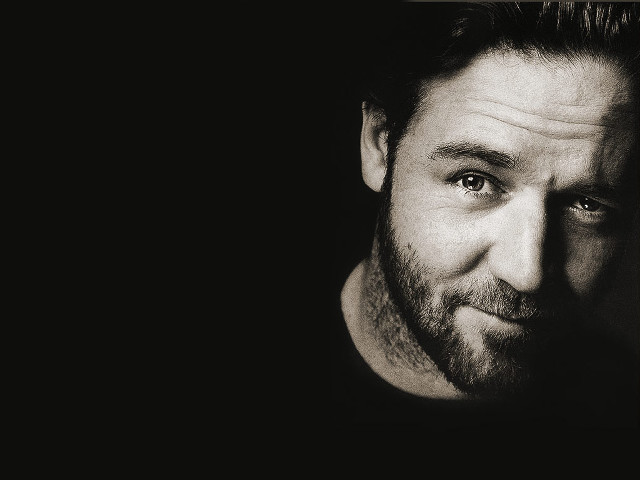 Bearded man smiling black background free wallpaper - medium preview image