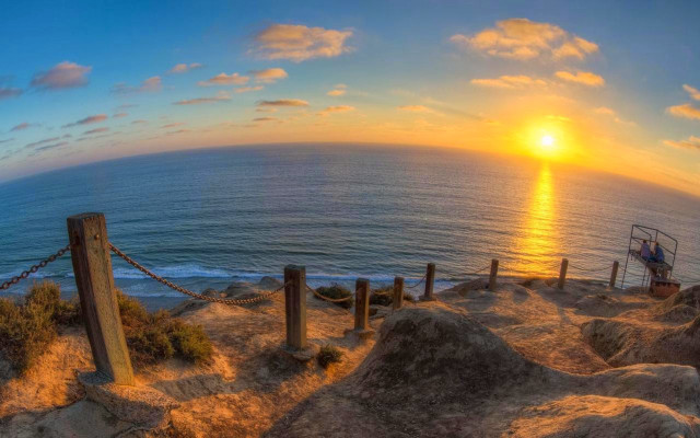 Sunset ocean lifeguard tower rope free wallpaper - medium preview image
