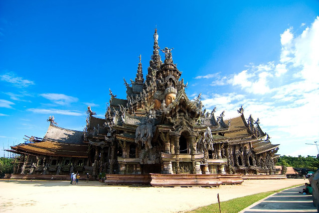 Large building statues sky clouds free wallpaper - medium preview image