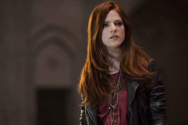 Red haired woman black jacket free wallpaper - medium preview image