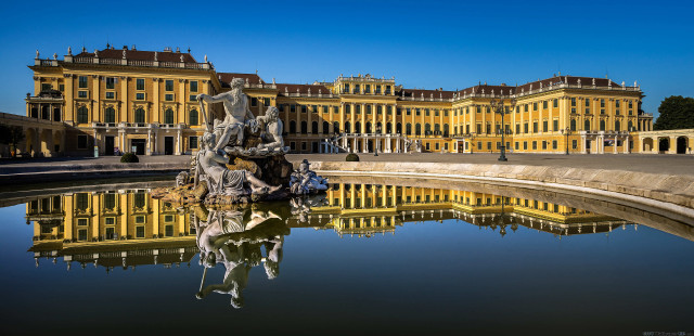 Large building fountain blue sky free wallpaper - medium preview image