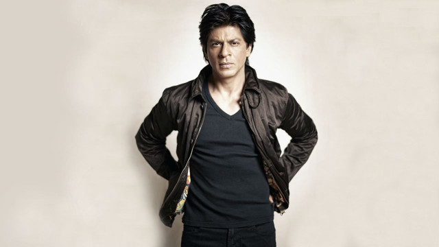 Man standing hands hips confident free wallpaper - medium preview image