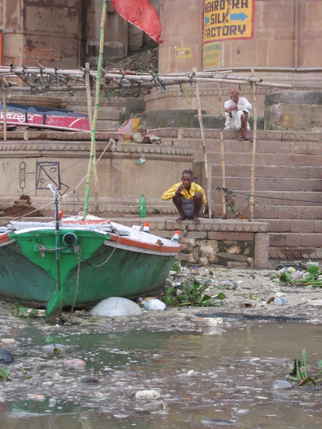 Man boat river building steps free wallpaper - medium preview image