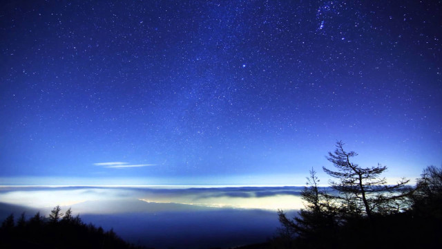 Night sky stars clouds trees free wallpaper - medium preview image