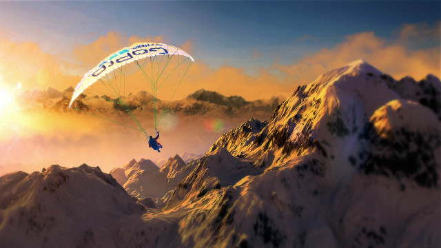 Parasailing mountain range sunset sky free wallpaper - medium preview image