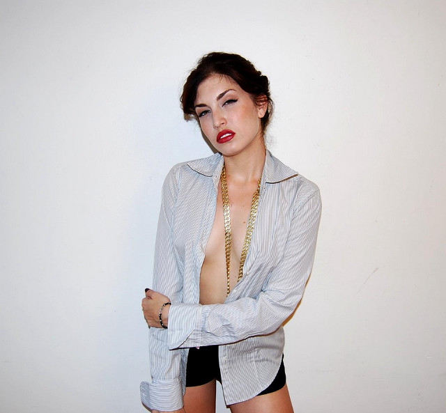 Woman shirt necklace posing picture free wallpaper - medium preview image