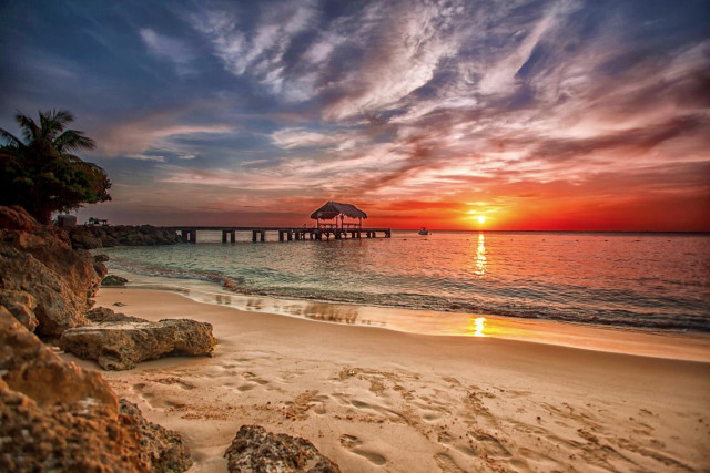 Sunset beach pier clouds sky free wallpaper - medium preview image