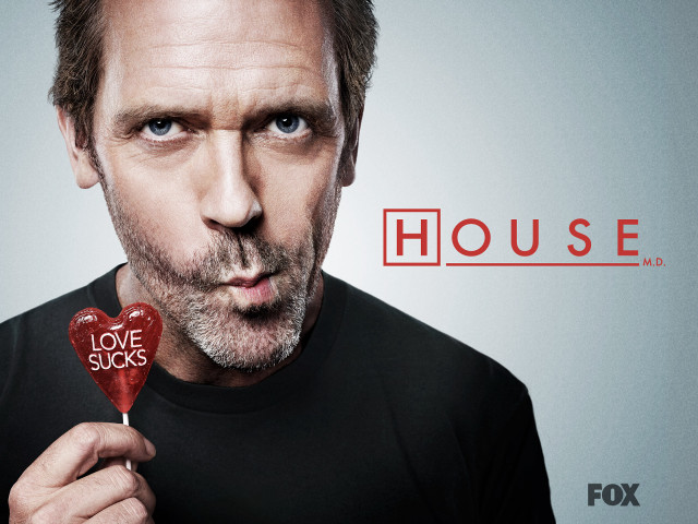 Man holding heart shaped lollipop free wallpaper - medium preview image