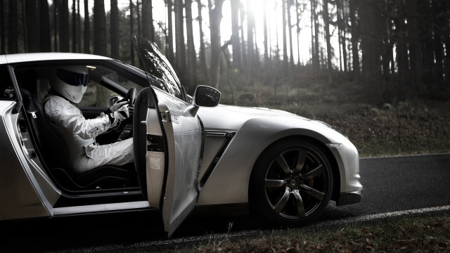 White suit man driving sports free wallpaper - medium preview image