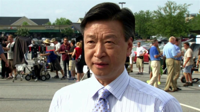 Man tie crowd parking lot free wallpaper - medium preview image