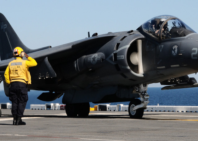 Fighter jet airport runway ocean free wallpaper - medium preview image