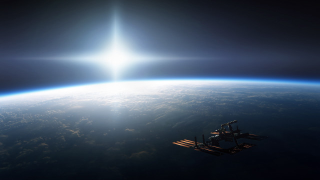 Space station earth sun beam free wallpaper - medium preview image