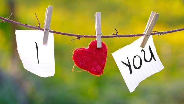 Couple small pieces paper hanging free wallpaper - medium preview image