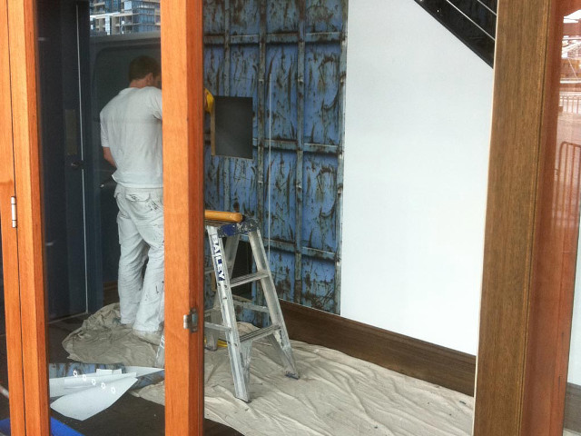 Man ladder blue door room free wallpaper - medium preview image