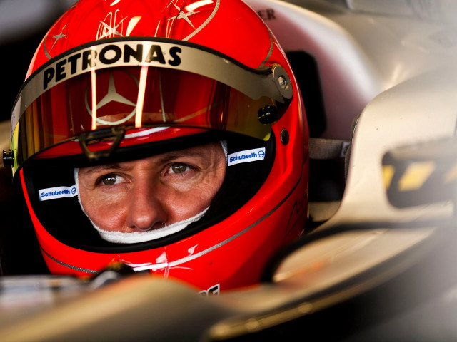 Man red helmet car white free wallpaper - medium preview image