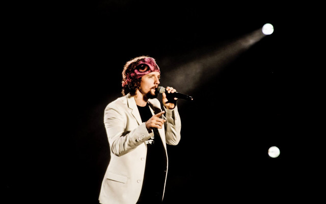 Man white suit pink goggles free wallpaper - medium preview image