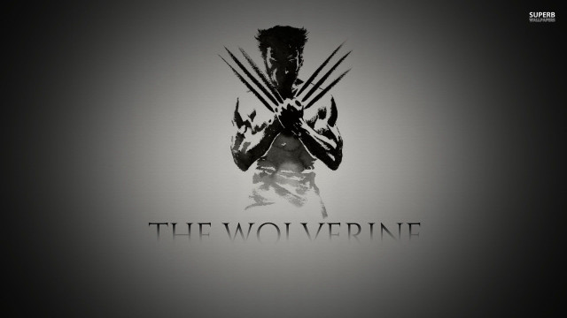 Man holding wolverine logo chest #2 free wallpaper - medium preview image