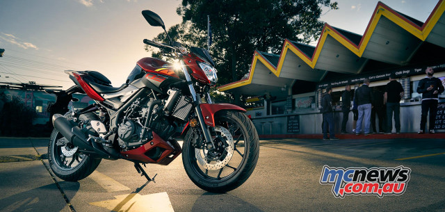 Red motorcycle night promotional vehicle free wallpaper - medium preview image
