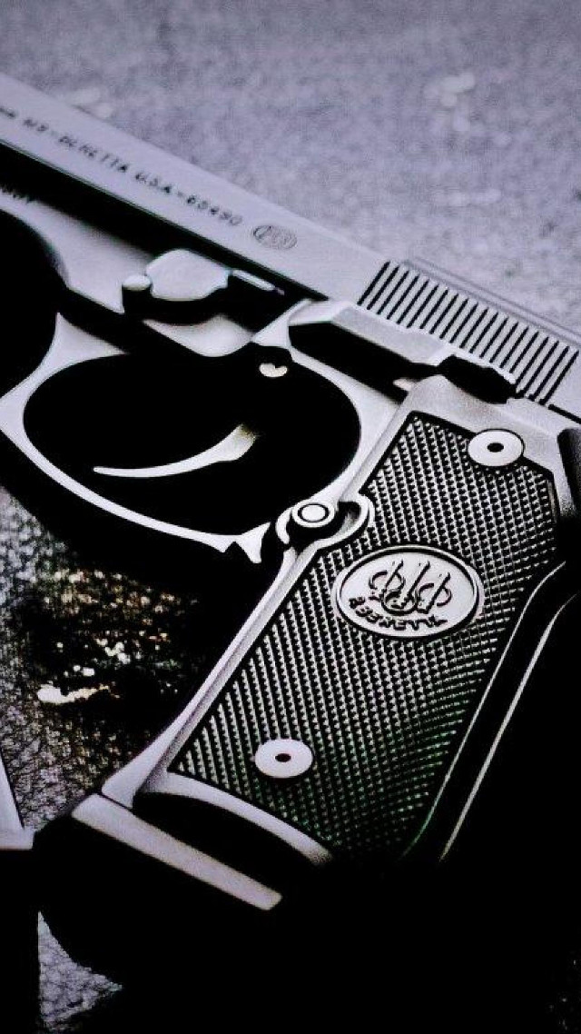 Gun closeup table black white free wallpaper - medium preview image