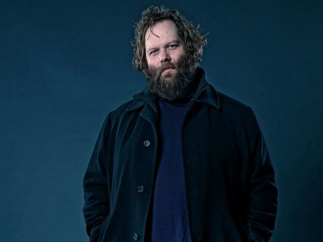 Man beard coat posing picture free wallpaper - medium preview image