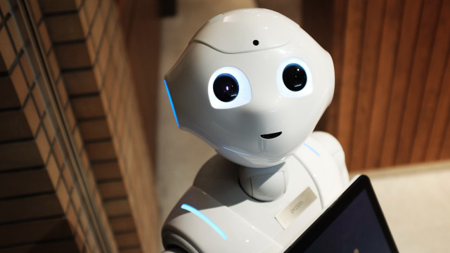 Robot smiling ai mitsu cybernetics free wallpaper - medium preview image