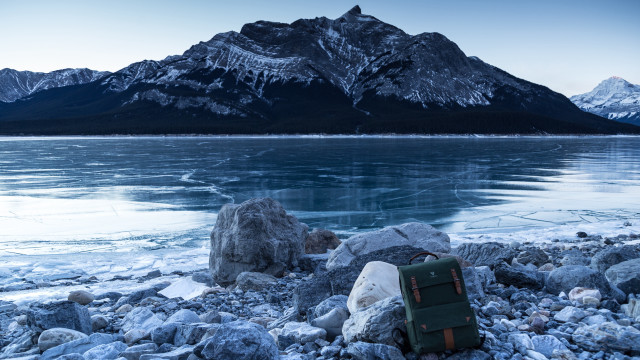 Suitcase rocky beach mountain lake free wallpaper - medium preview image