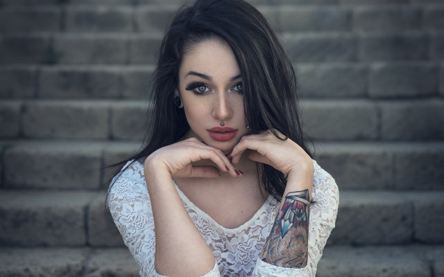 Tattooed woman stairs flowers brick free wallpaper - medium preview image