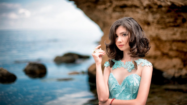 Woman blue dress ocean rock free wallpaper for desktop - medium preview image