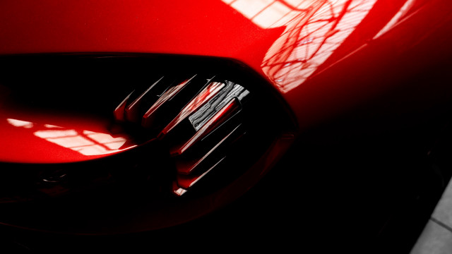 Red car metal fork shadow free wallpaper - medium preview image
