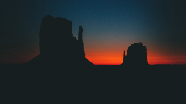 Sunset silhouette rock formation orange free wallpaper - medium preview image