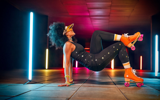 Woman rollerblading neon crown kitsch free wallpaper - medium preview image