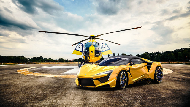 Yellow sports car helicopter cloudy free wallpaper - medium preview image