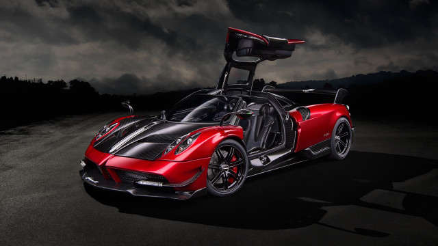 Red sports car dark road free wallpaper - medium preview image
